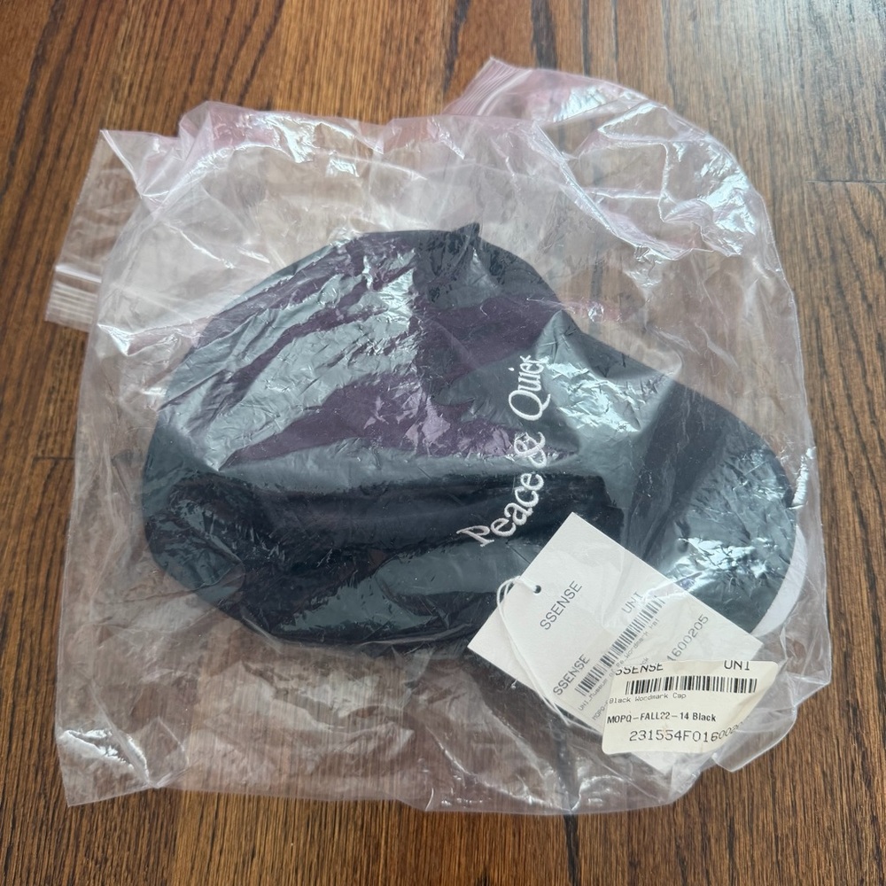 6 panel cap from The Museum of Peace & Quiet. New